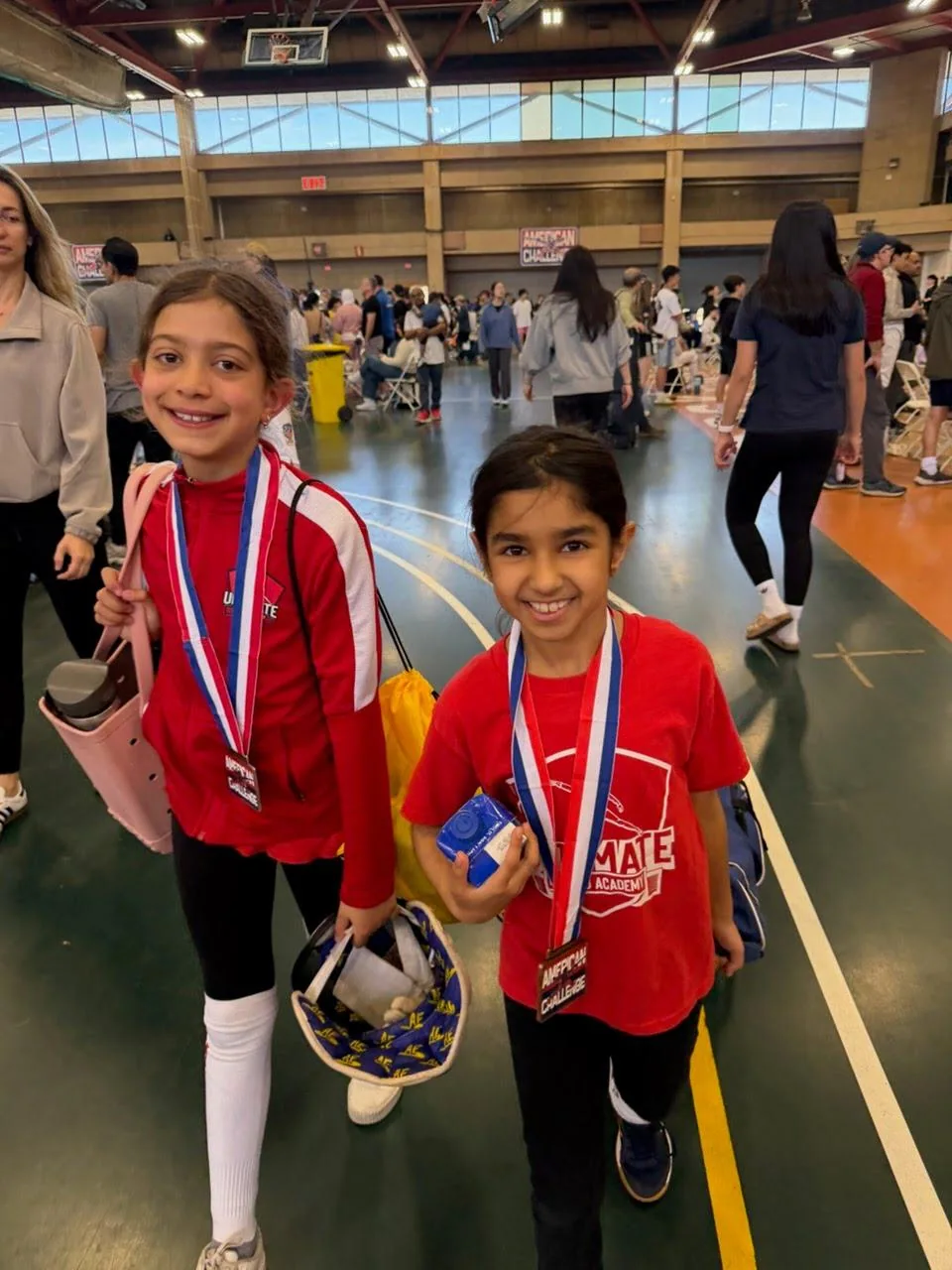 UFA students displaying medals from competition