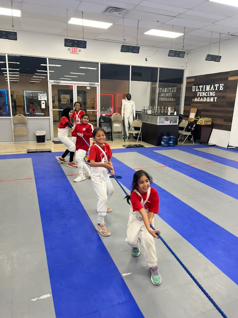 Campers doing rope coordination drill