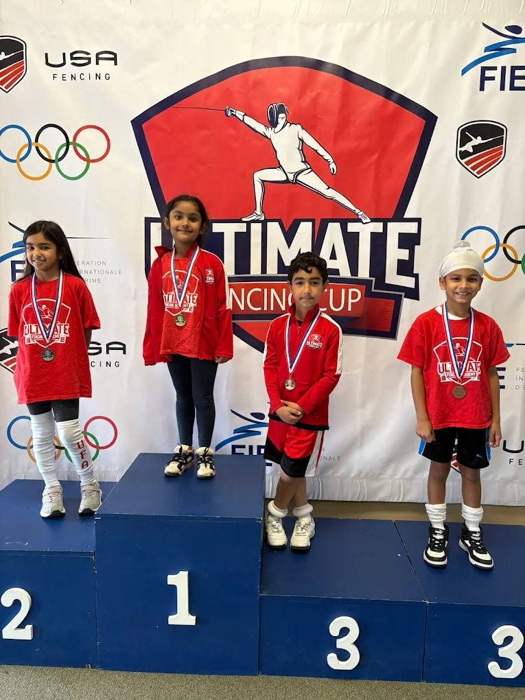 Podium celebration at fencing competition
